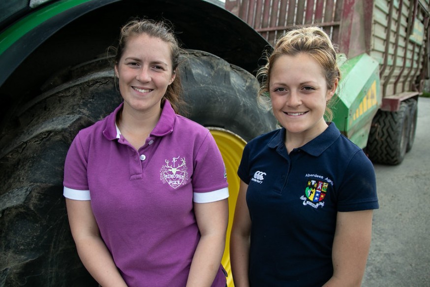 Photo of Kirsty and Aimee smilling. Both are young farming climate change champions.