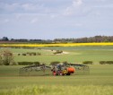 A tractor spreading slurry