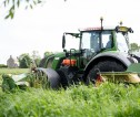 A tractor cutting silage