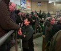 Rural Secretary Mairi Gougeon speaking with crofters and farmers at a livestock auction