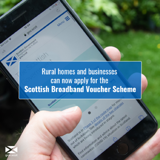 Picture of phone with text detailing Scottish Broadband Voucher scheme