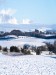 Snowy covered fields and castle