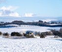 Snowy covered fields and castle